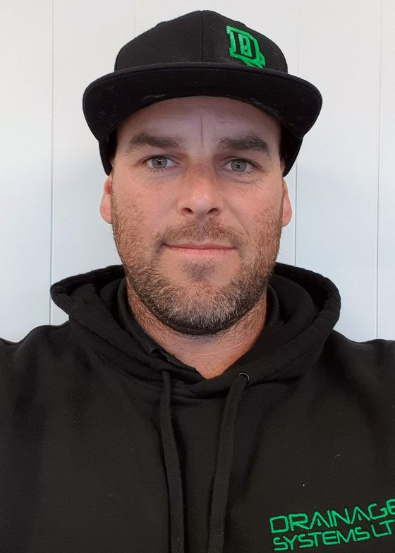 Portrait of Sam, certifying drainlayer at Drainage Systems