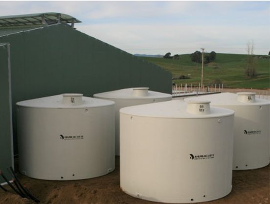 Group of above-ground Duracrete concrete water tanks